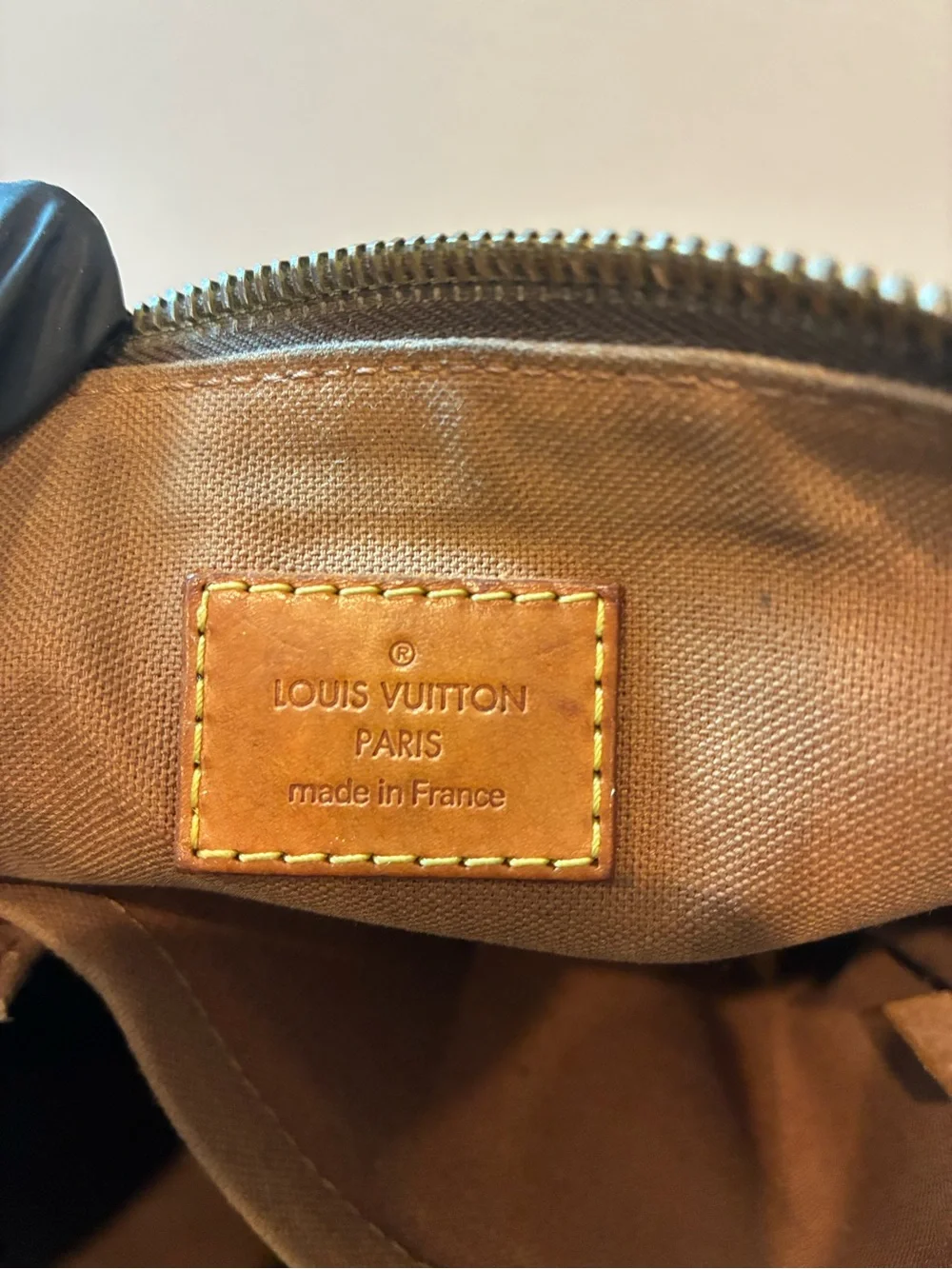 LOUIS VUITTON POPINCOURT HANDBAG.